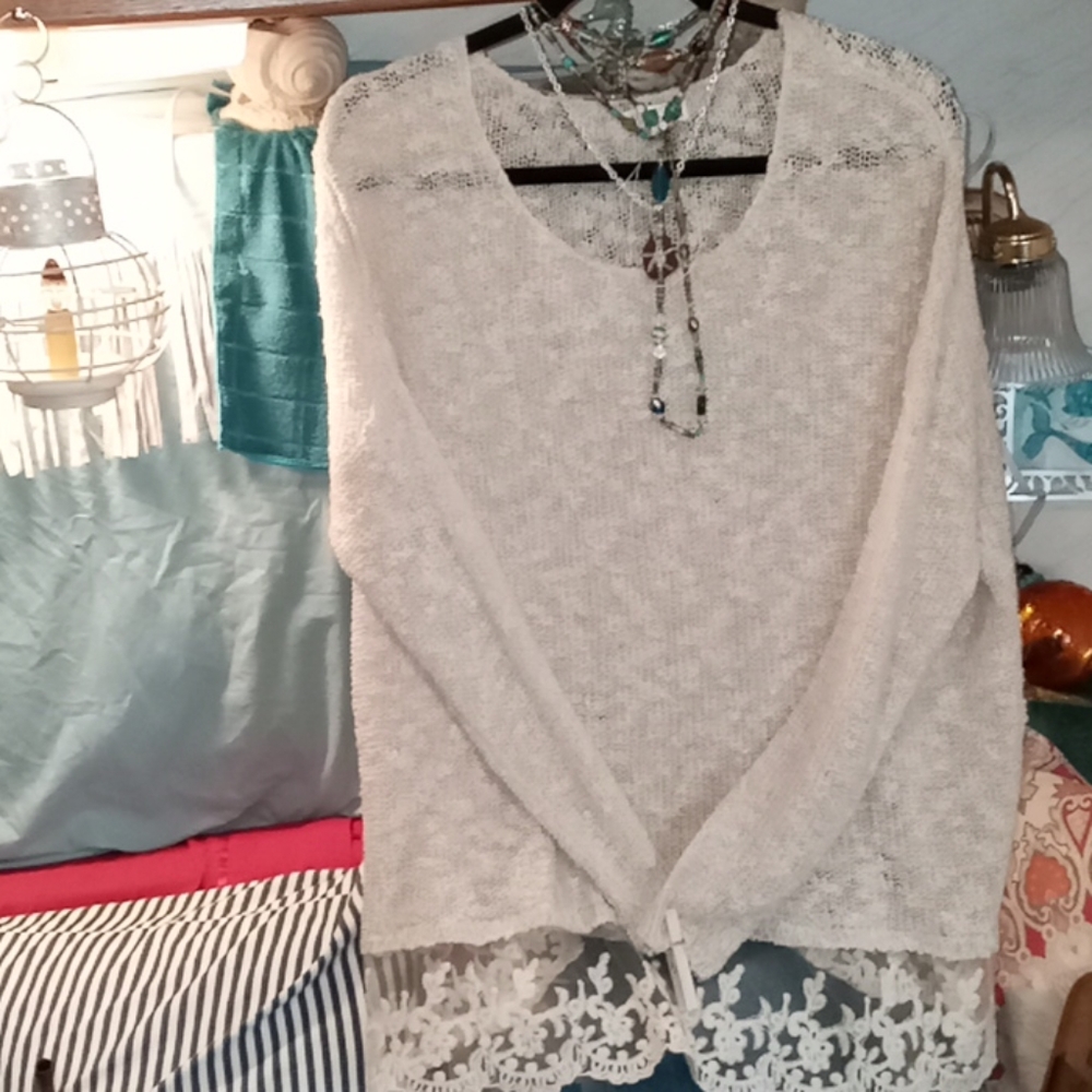 "L"  sweater  with lace trim at hip and L/S.